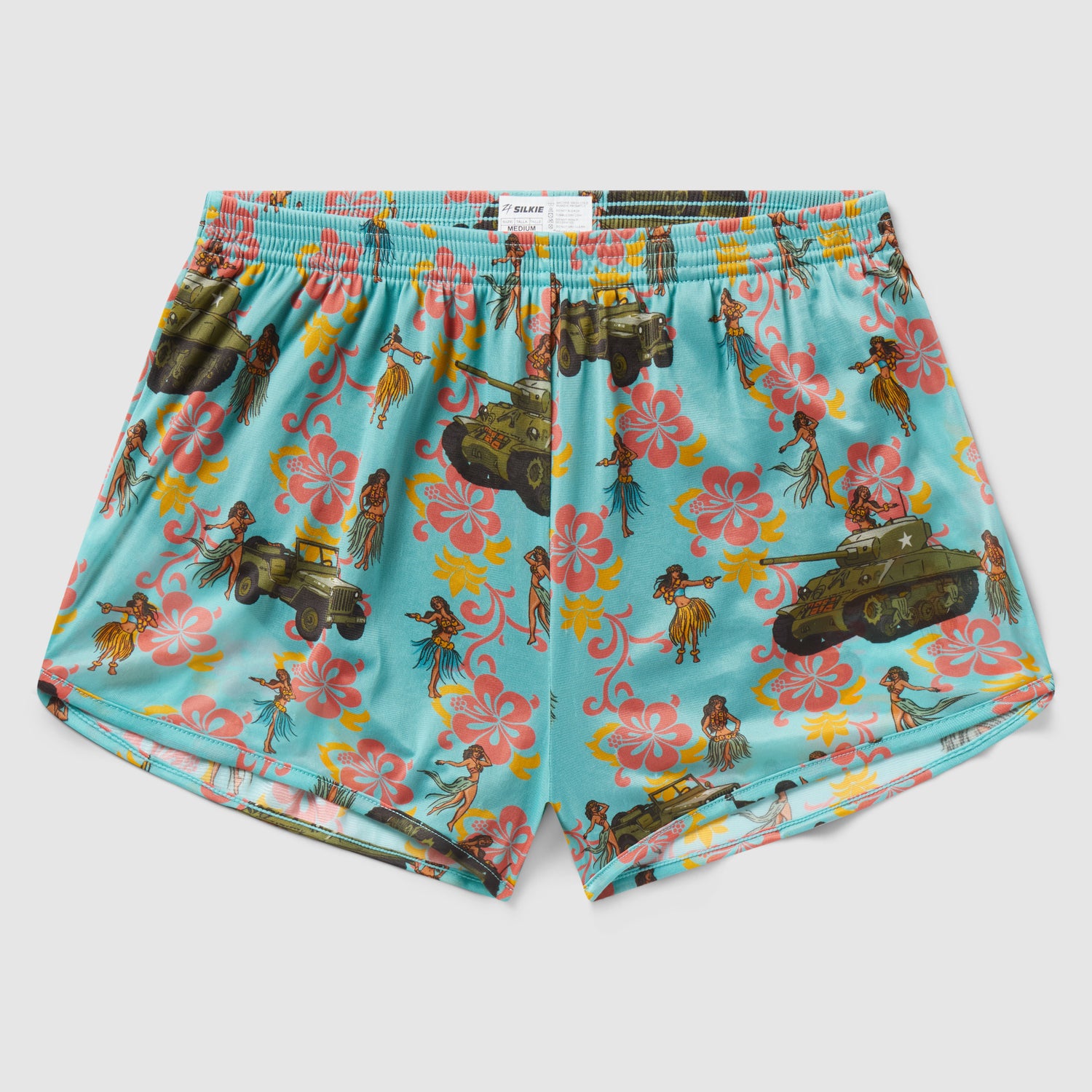 Hula Tank Blue Silkies featuring a light blue base with a playful pattern of vintage tanks, hula dancers, and colorful tropical flowers on lightweight fabric shorts.
