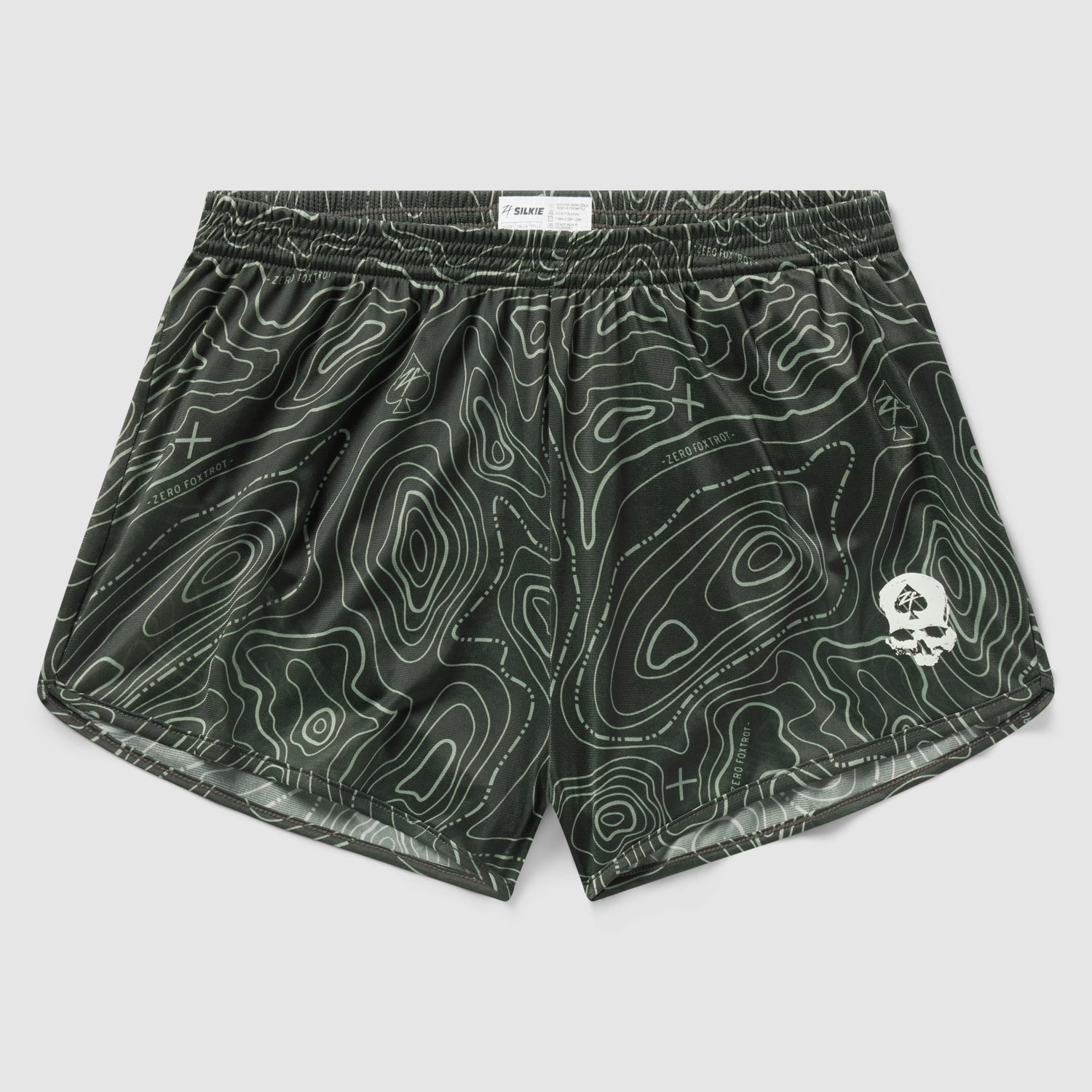 Topographic Silkies in dark green featuring a contour map pattern with a small white skull emblem on the front leg and an elastic waistband for comfort.