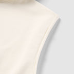 Close-up detail of the light cream fabric and seam on the sleeveless armhole of the Smuggler French Terry Muscle Hoodie.