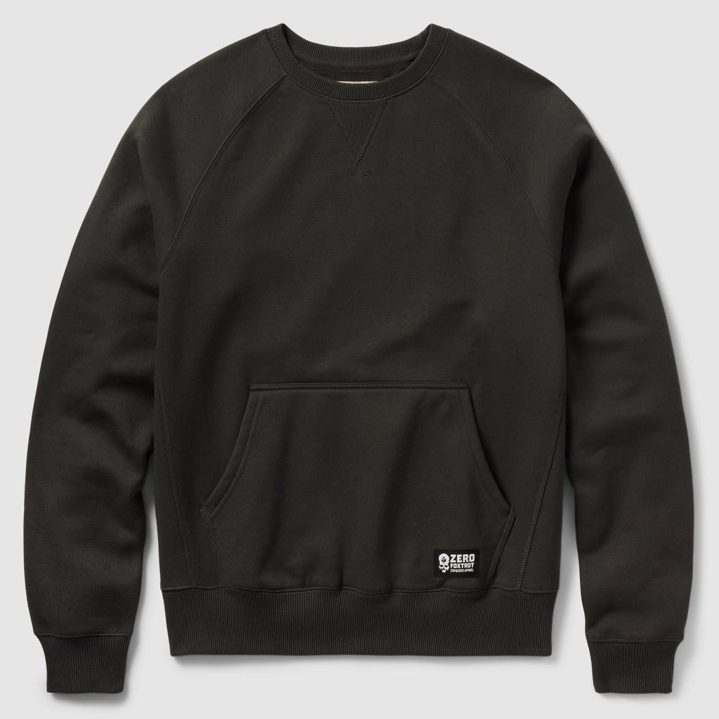 Smuggler Fleece Crew in black with a ribbed crew neckline, raglan sleeves, kangaroo pocket, ribbed cuffs and hem, and a small logo patch near the pocket.