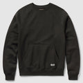 Smuggler Fleece Crew in black with a ribbed crew neckline, raglan sleeves, kangaroo pocket, ribbed cuffs and hem, and a small logo patch near the pocket.