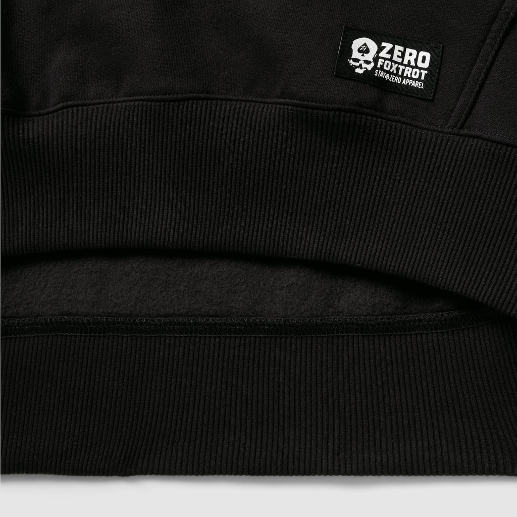 Smuggler Fleece Crew black fleece close up showing ribbed waistband and soft fleece lining