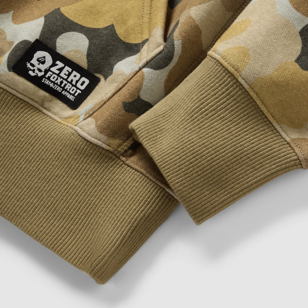 Smuggler Fleece Crew camouflage fleece sweatshirt closeup showing ribbed cuffs and hem with a visible Zero Foxtrot label