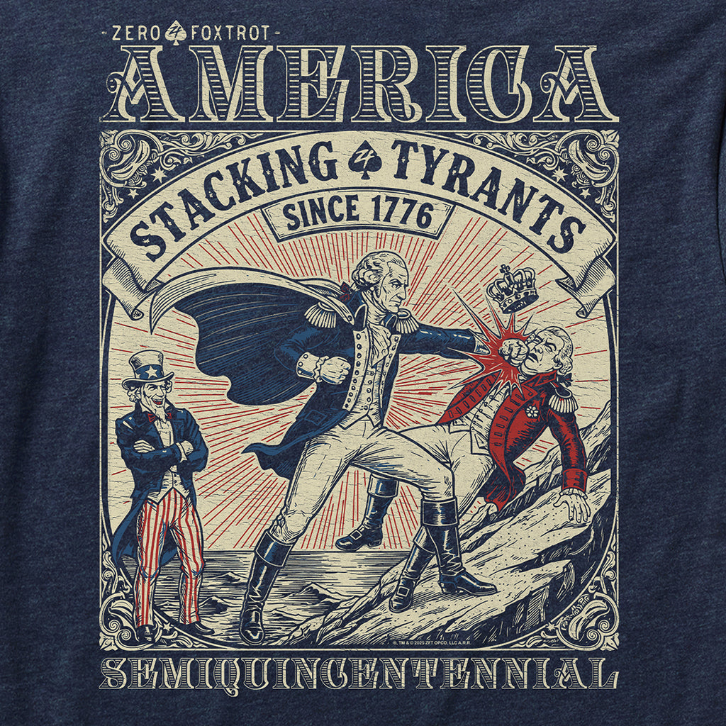 Close-up of a navy blue Stacking Tyrants Tee featuring a vintage-style graphic of a historical figure punching a crowned tyrant with Uncle Sam watching, surrounded by ornate framing and text.