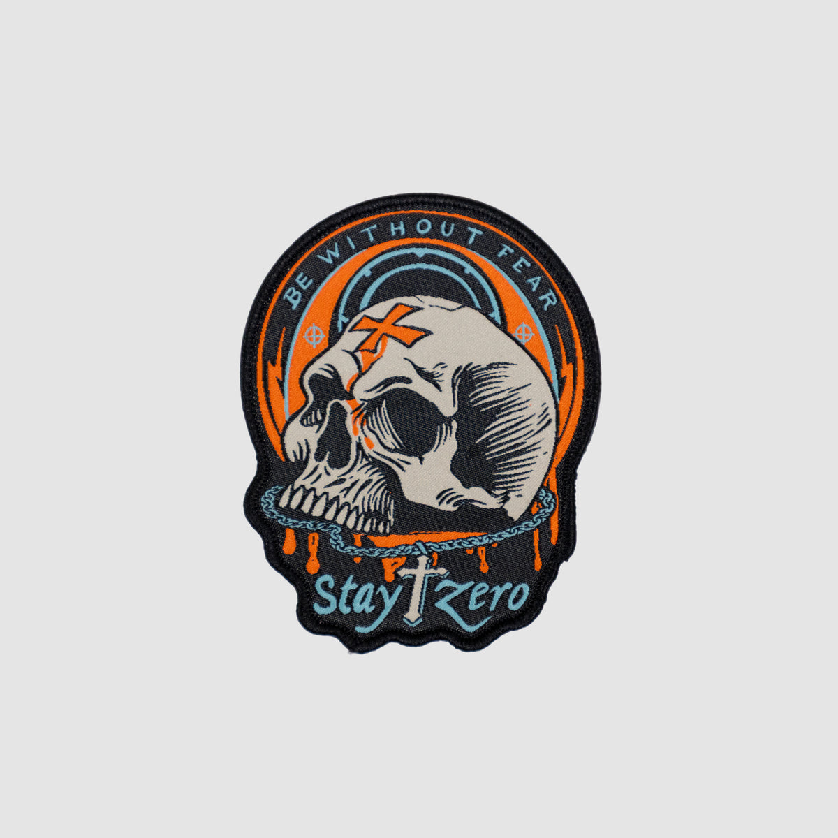 Without Fear Patch featuring an embroidered skull design with orange accents and the words Without Fear and Stay Zero in bold lettering
