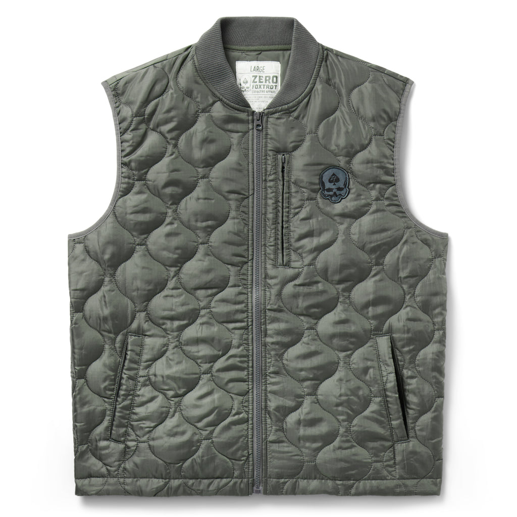 Woobie Vest (Last Chance), gray quilted sleeveless vest with ribbed collar, full front zipper, zippered pockets, and chest patch shown from the front