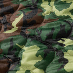 Woobie Hoodie (Last Chance) featuring a close-up of green, brown, black, and tan camouflage fabric with water droplets on the surface