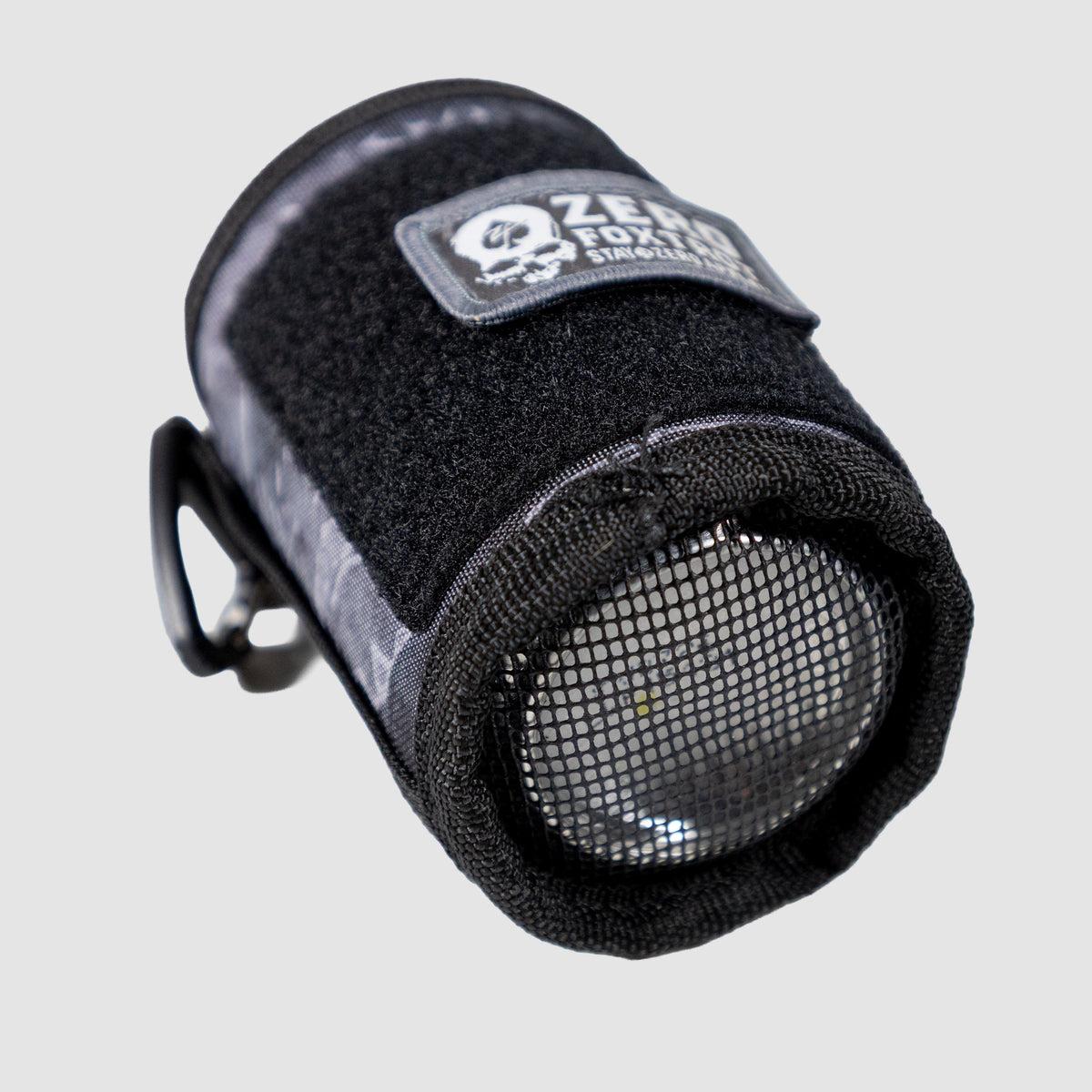 Close-up of a black Rations Drink Wrap with mesh end, designed to securely hold a bottle, featuring durable fabric and a Velcro strap for adjustable fastening.