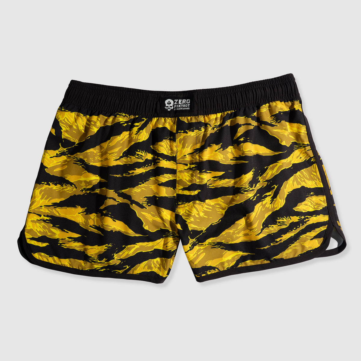 Yellow and black tiger stripe patterned ZF Fight Shorts with a black elastic waistband and a small branded label at the center front.