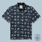 Navy blue short-sleeve button-up Surf Shirts featuring a patriotic pattern with stars, the year 1776, and red, white, and blue eagle motifs.