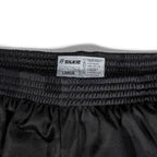 Close-up of the elastic waistband and care label on ZF Silkies - Camos in black, showing size large and washing instructions printed on the tag.