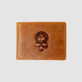 Smuggler Leather Wallet in brown leather featuring a dark embossed skull design with a spade symbol, showcasing fine stitching and a smooth finish.