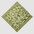 Green and beige camouflage patterned bandana with a solid green border, featuring subtle text detail, part of the ZF Bandanas collection.