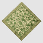 Green and beige camouflage patterned bandana with a solid green border, featuring subtle text detail, part of the ZF Bandanas collection.