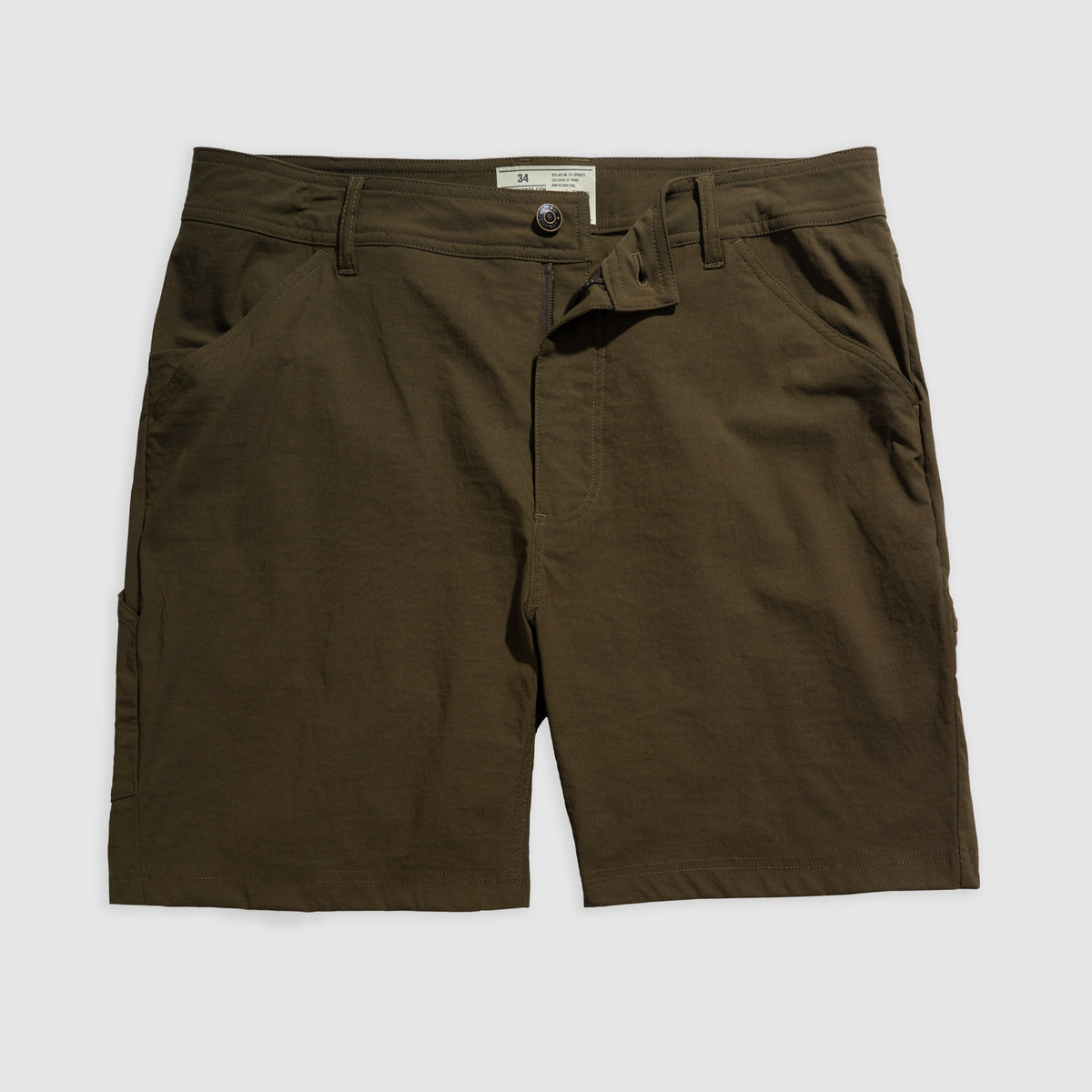 Olive green Field Shorts laid flat showing front side with button and zip closure, belt loops, and side pockets in a smooth fabric finish.