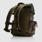 Woobie Backpack shown from the back, featuring padded shoulder straps and camouflage pattern with woodlands colors, designed for outdoor and tactical use.