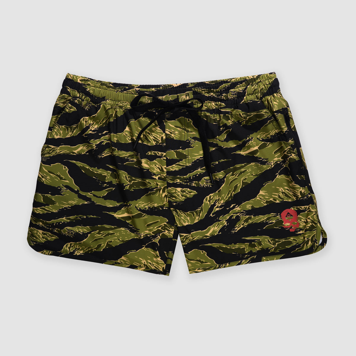 Olive green and black tiger stripe patterned shorts with a red logo on the leg and a black drawstring waistband, designed as Zero Shorts - 5" Inseam.