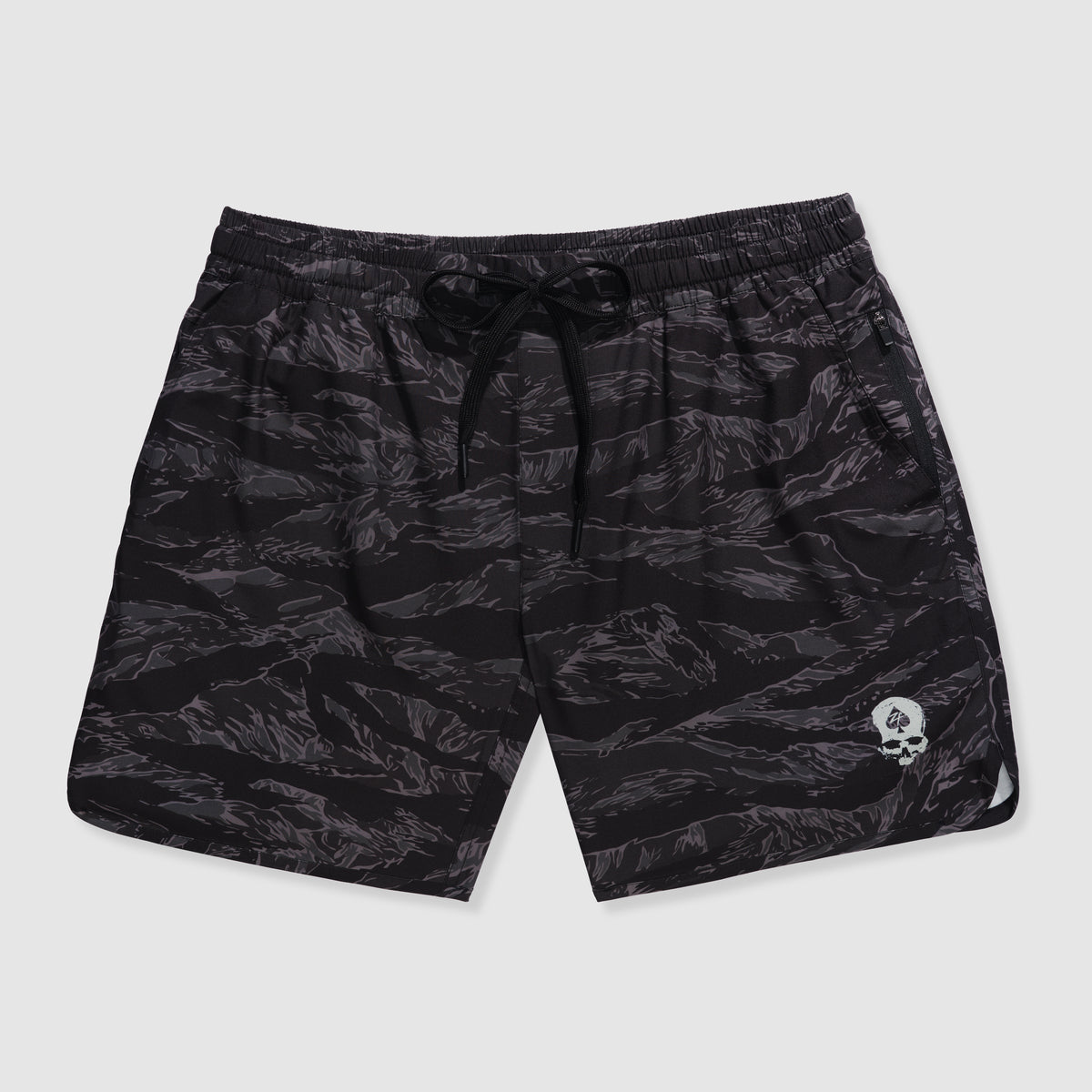 Zero Shorts - 7" Inseam in a black tiger stripe pattern with an elastic waistband and drawstring, featuring a subtle skull logo near the hem.