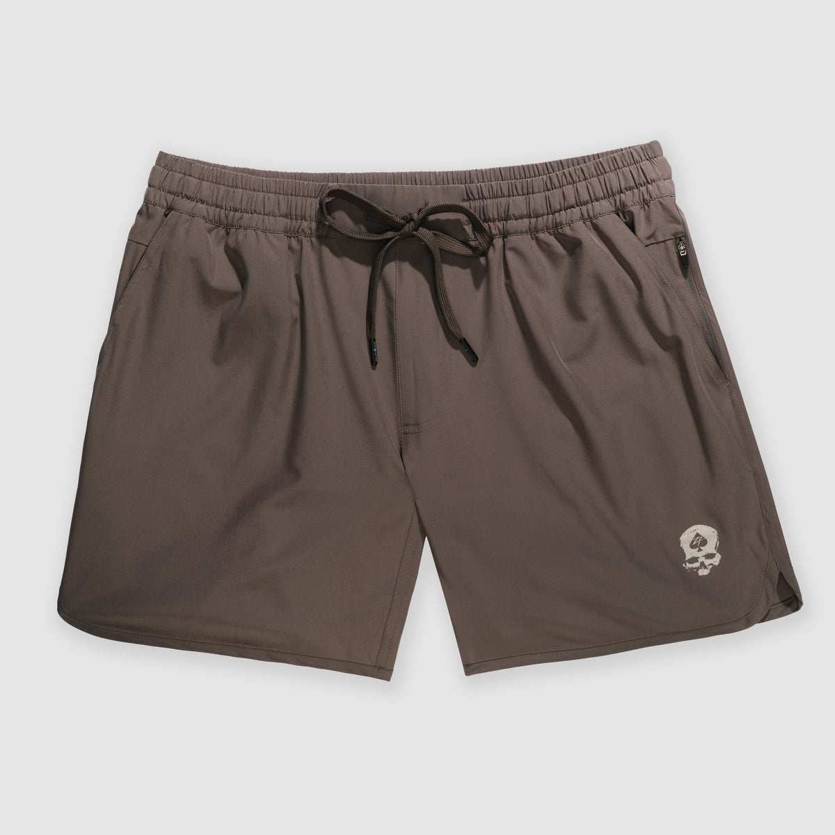 Gray casual shorts with an elastic waistband and adjustable drawstring, featuring side pockets and a small skull logo near the hem, designed as Zero Shorts - 7" Inseam.
