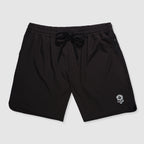 Black athletic shorts with an elastic waistband and drawstring, featuring a small skull logo on the lower leg, labeled as Zero Shorts - 9" Inseam.