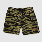 Zero Shorts - 9" Inseam featuring an olive green and black tiger stripe camouflage pattern with an elastic waistband and black drawstring.