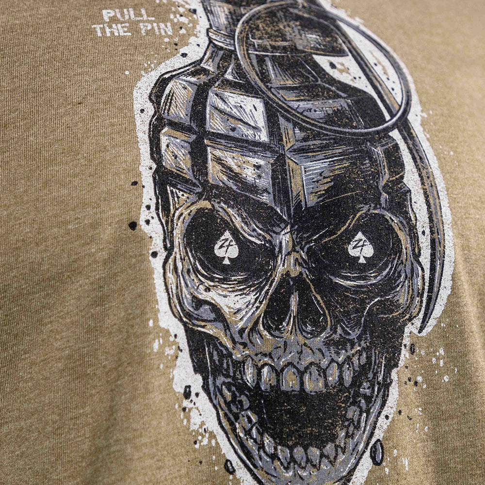 Pull the Pin Tee with a detailed black and white skull graphic wearing a tactical helmet on an olive green shirt