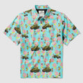 Bright blue short-sleeve button-up Surf Shirts featuring a playful pattern of military tanks, soldiers, and pink tropical flowers, combining casual style with unique bold prints.